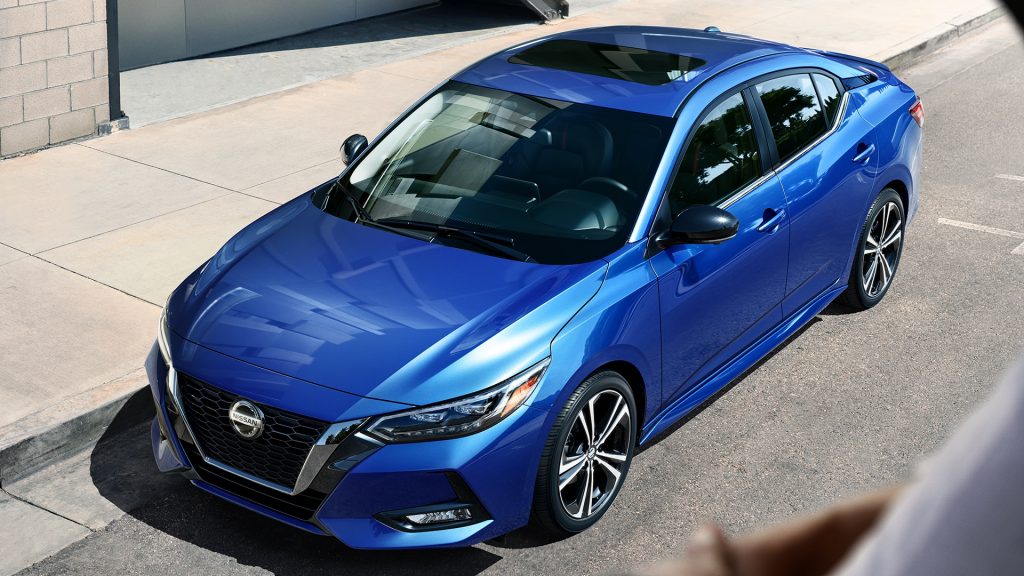 Blue 2020 Nissan Sentra parked at a curb